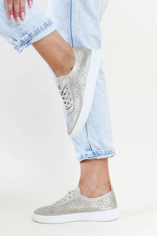 Zapatillas doradas de piel ecológica...