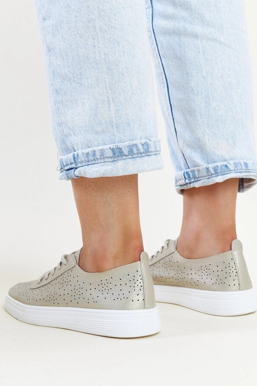 Zapatillas doradas de piel ecológica...