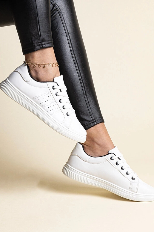 Zapatillas blancas de piel ecológica...