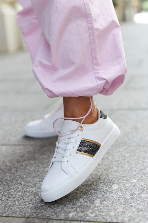 Zapatillas blancas con tira...