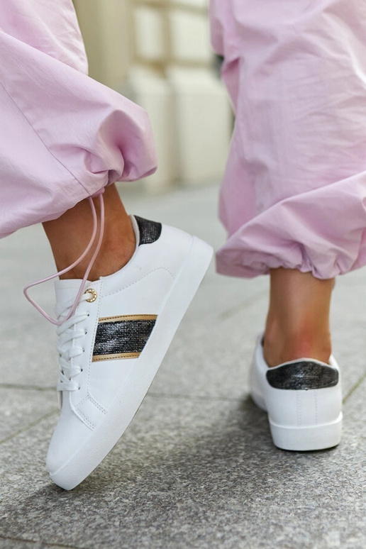 Zapatillas blancas con tira...