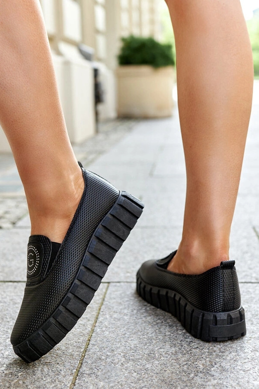 Botas negras de media caña con suela...