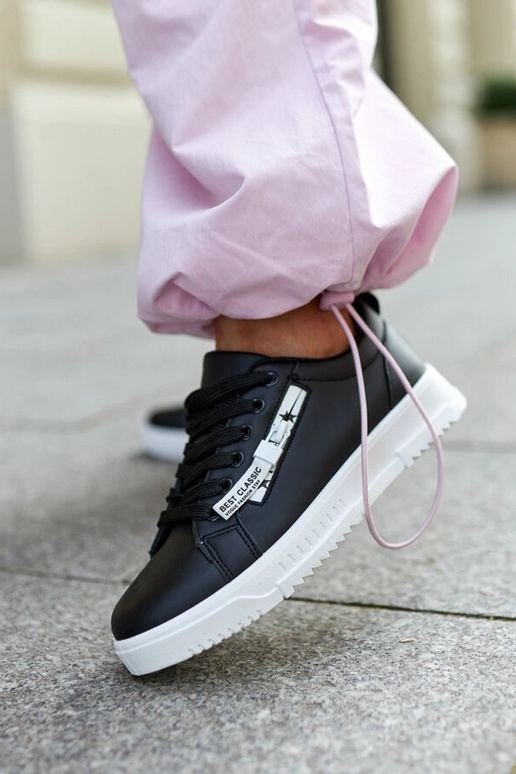 Zapatillas negras de piel ecológica...