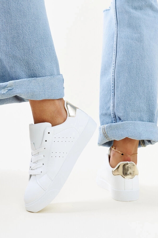 Zapatillas Akila blancas y doradas