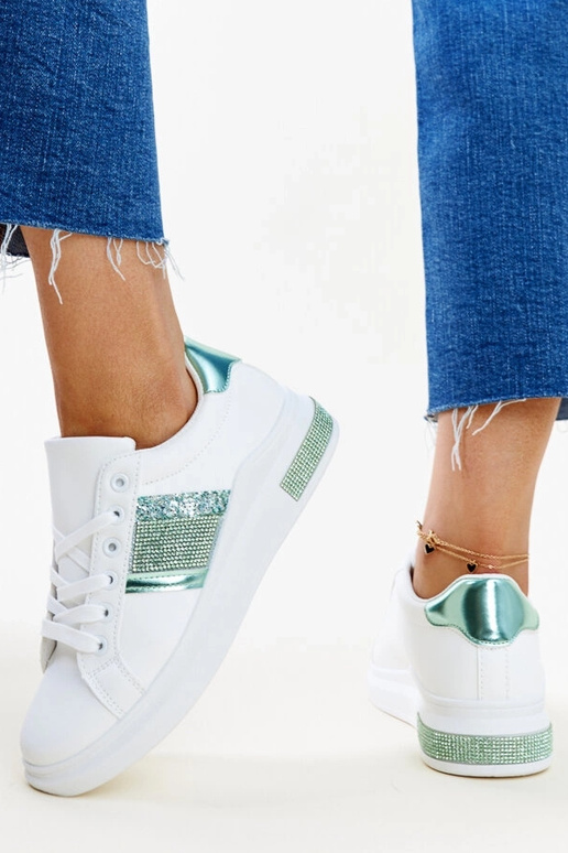 Zapatillas blancas y verdes con...