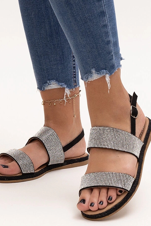 Sandalias negras decoradas con...