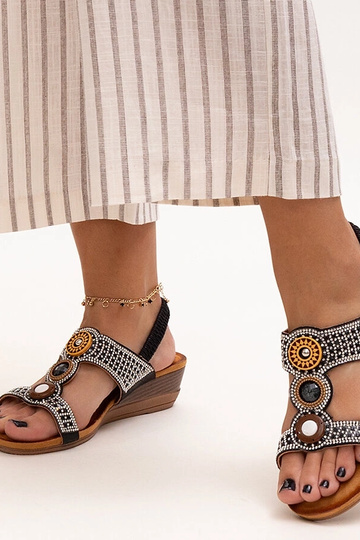 Sandalias de cuña baja brillantes Azeeza