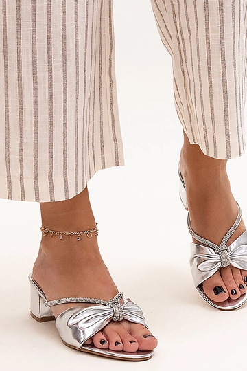 Mules de tacón de bloque...