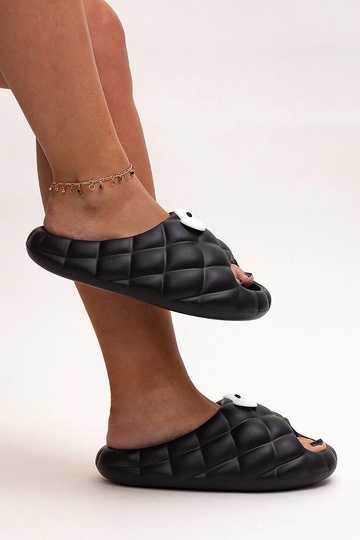 Chanclas de espuma negra con ojos de Gorges