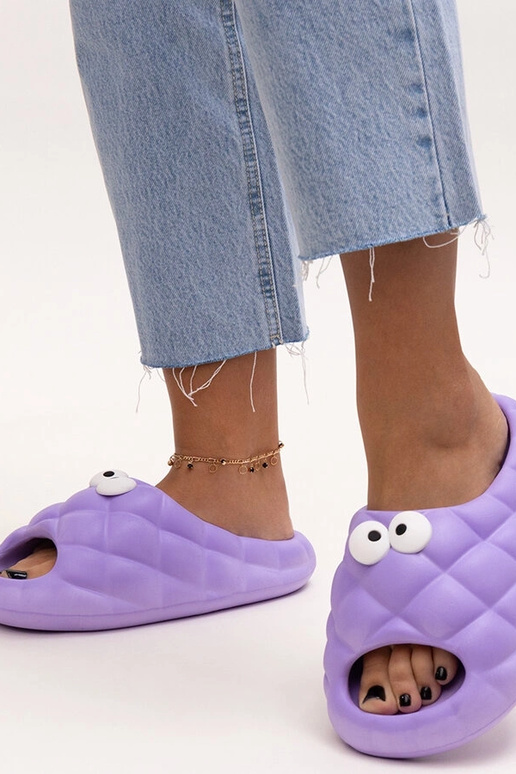 Pantuflas de espuma morada con ojos...