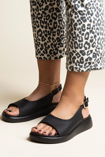 Sandalias negras con suela... 2