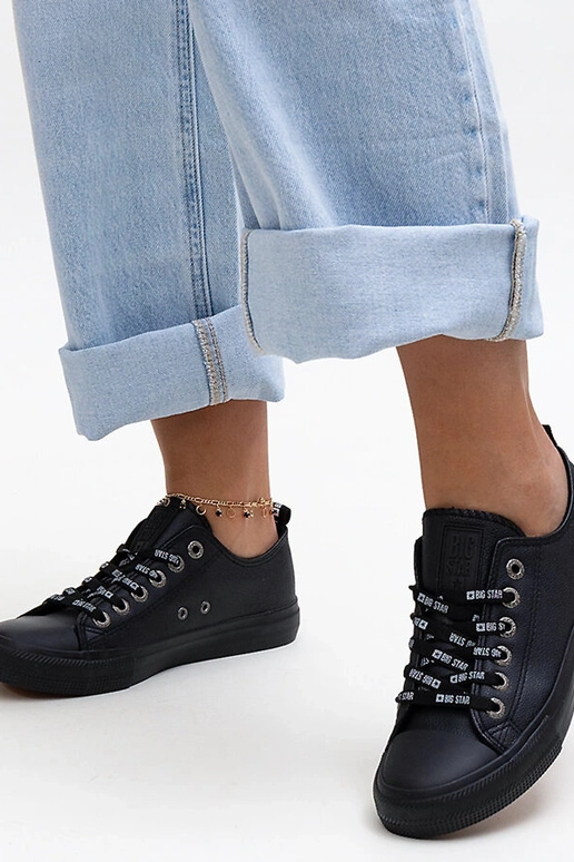 Zapatillas negras de piel ecológica...