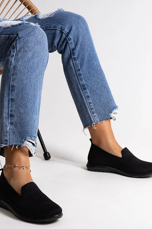 Zapatillas negras con suela de espuma...