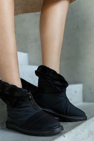 Botines de nieve negros...