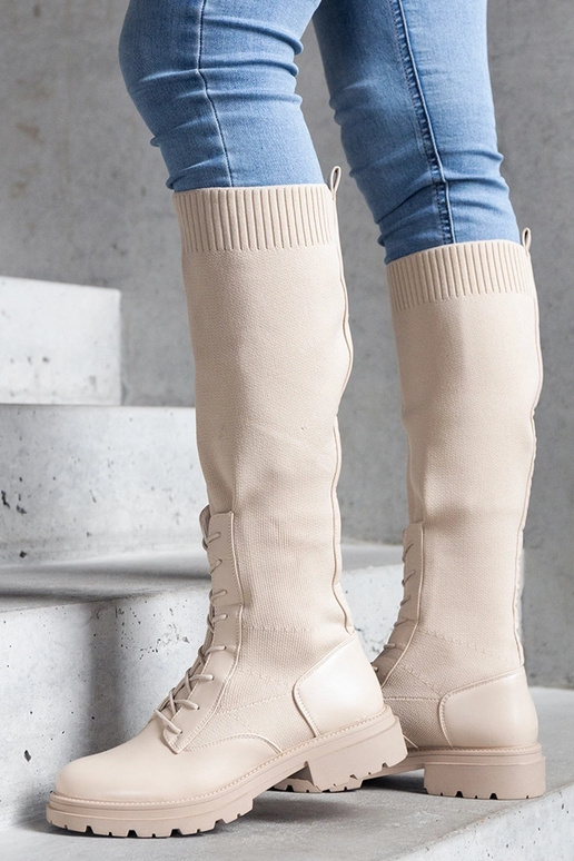 Botas beige sin cordones con parte...