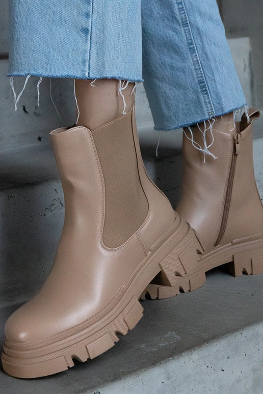 Botines beige cálidos con cremallera...