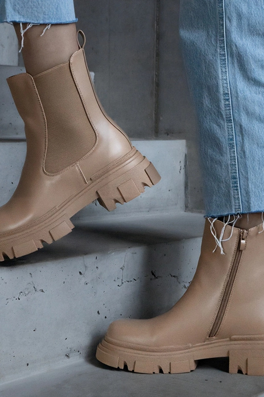 Botines beige cálidos con cremallera...