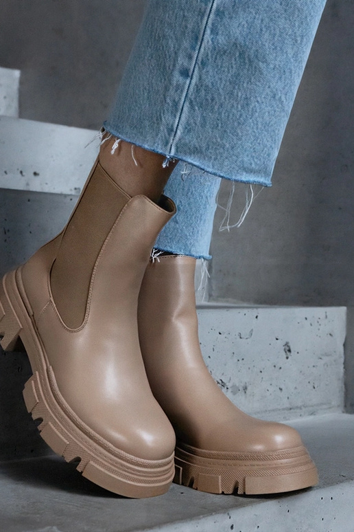 Botines beige cálidos con cremallera...