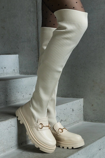 Botas beige claro con parte...