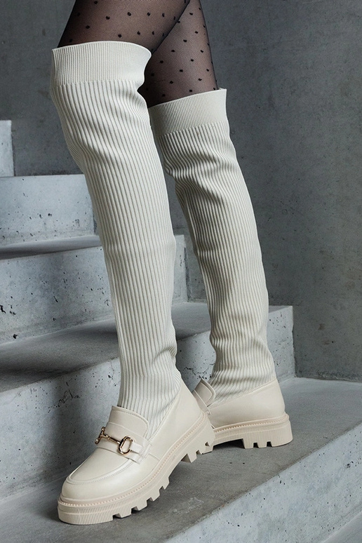 Botas beige claro con parte superior... Botas beige claro con parte superior...