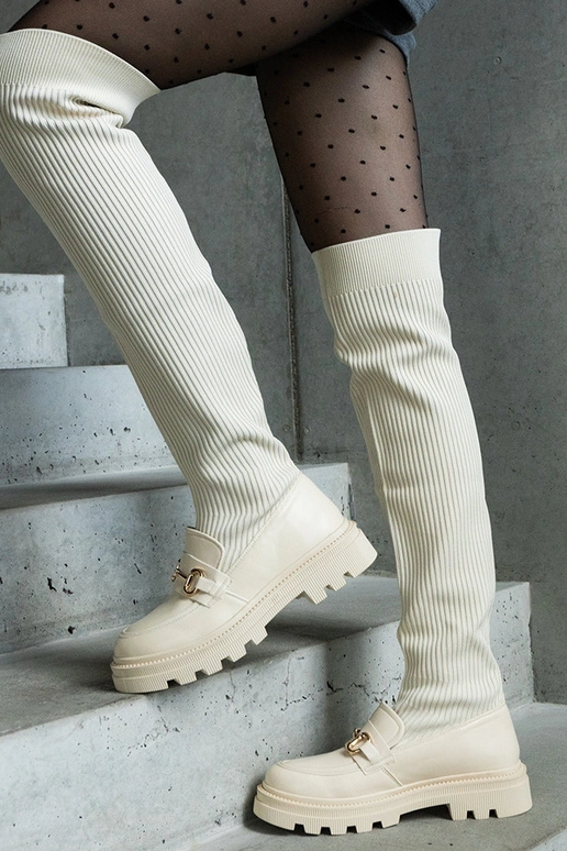 Botas beige claro con parte superior... Botas beige claro con parte superior...