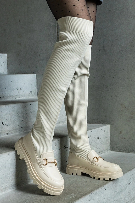 Botas beige claro con parte superior... Botas beige claro con parte superior...