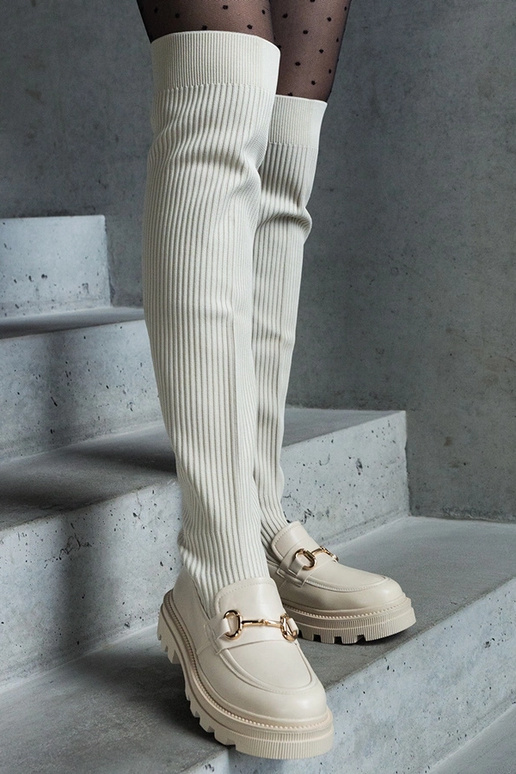 Botas beige claro con parte superior... Botas beige claro con parte superior...