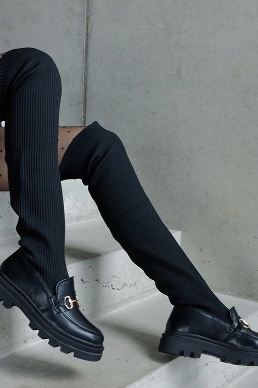 Botas negras con caña elástica y...