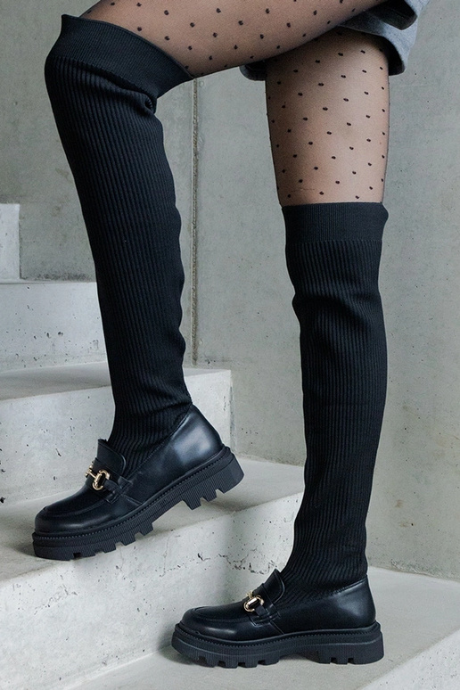 Botas negras con caña elástica y...