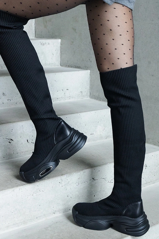 Botas negras sin cierre con caña...