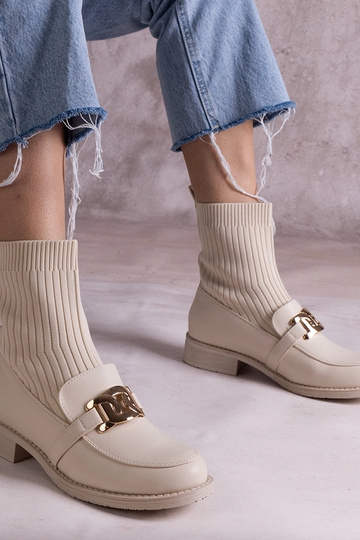 Botines beige con parte...