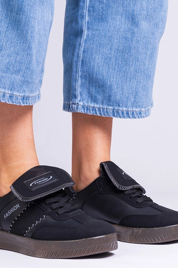 Zapatillas deportivas de mujer negras con costuras Puente
