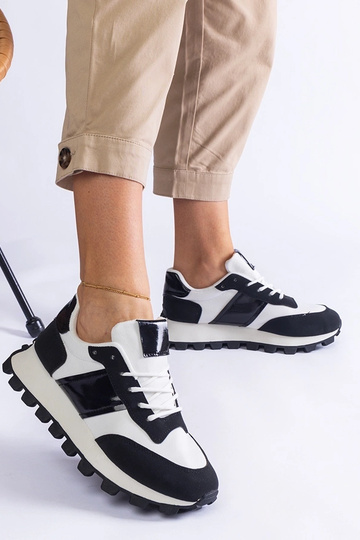 Zapatillas negras con... 2