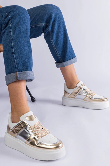 Zapatillas Kimberly doradas...