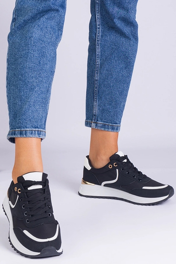 Zapatillas negras de mujer... 2