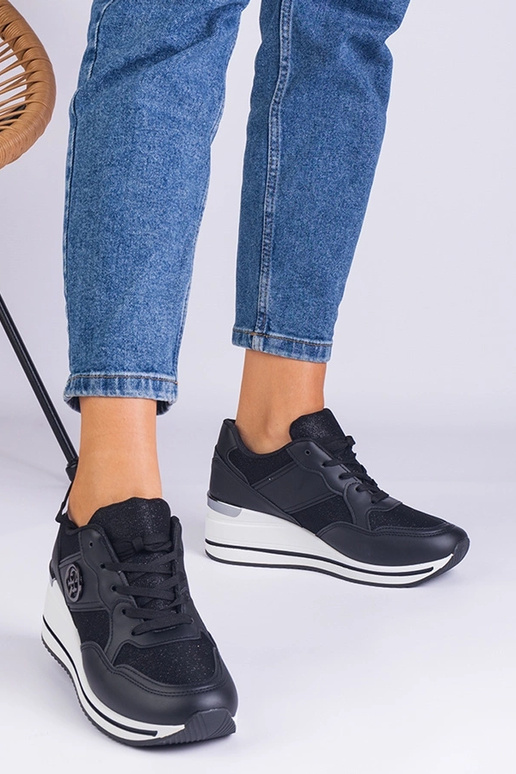 Zapatillas negras de mujer decoradas...