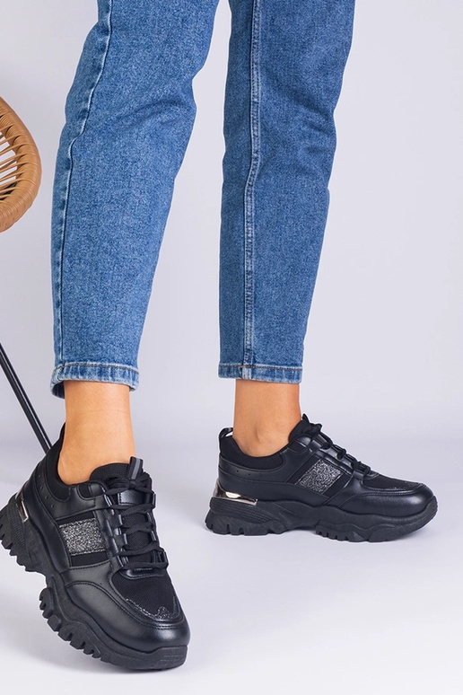 Zapatillas negras de mujer decoradas...