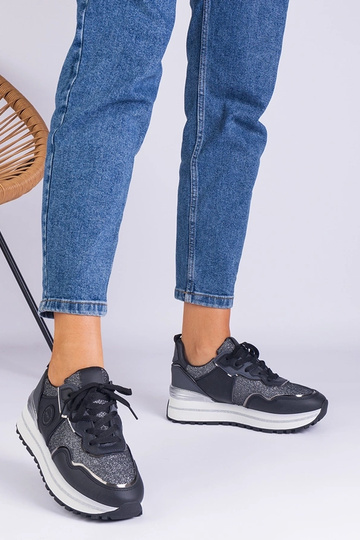 Zapatillas negras de mujer... 2