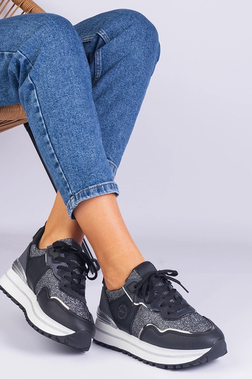 Zapatillas negras de mujer decoradas...