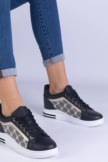 Zapatillas negras de mujer... 2