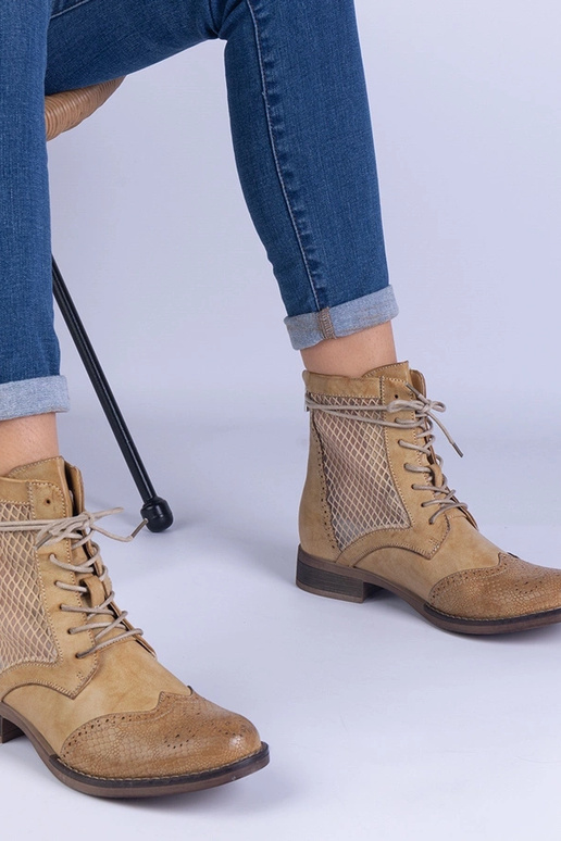 Botines planos calados amarillos Reeves