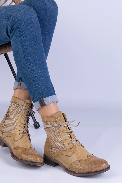 Botines planos calados amarillos Reeves