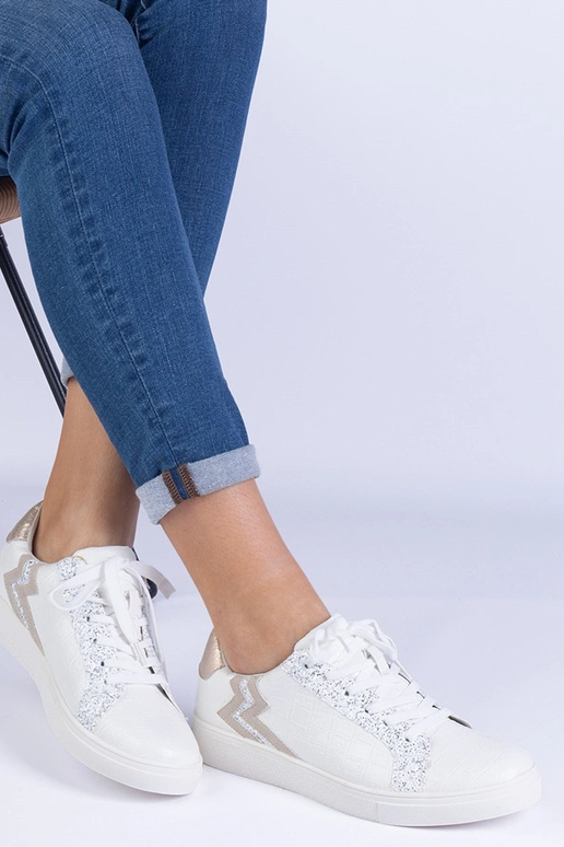 Zapatillas blancas de mujer con...