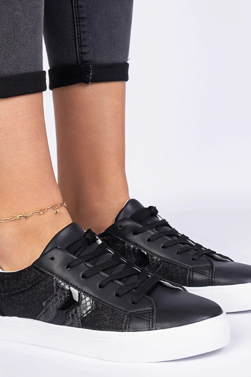 Zapatillas negras con motivo animal...