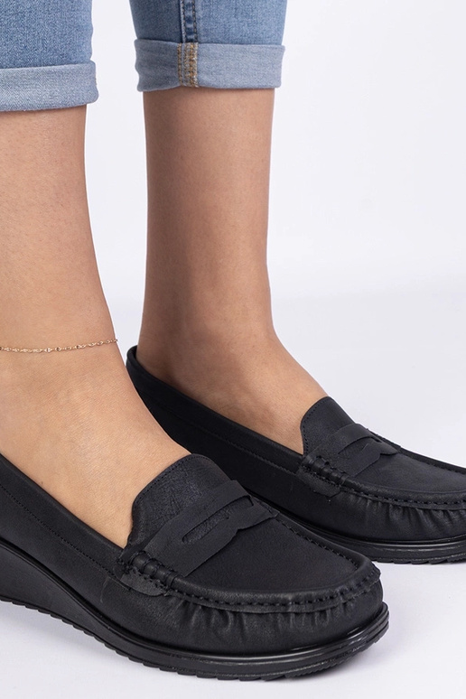 Mocasines negros de mujer con cuña...
