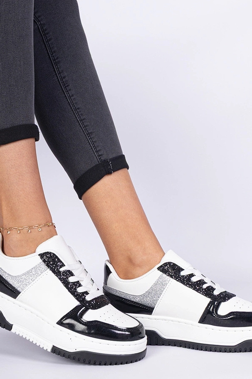 Zapatillas negras para mujer con...