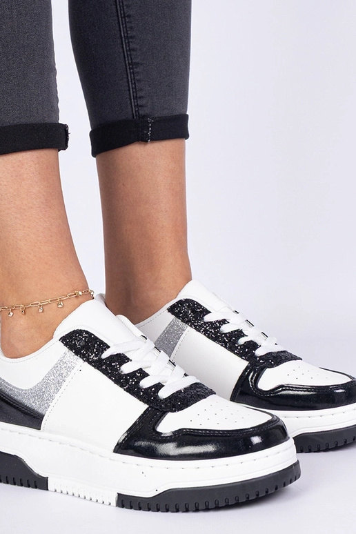 Zapatillas negras para mujer con...