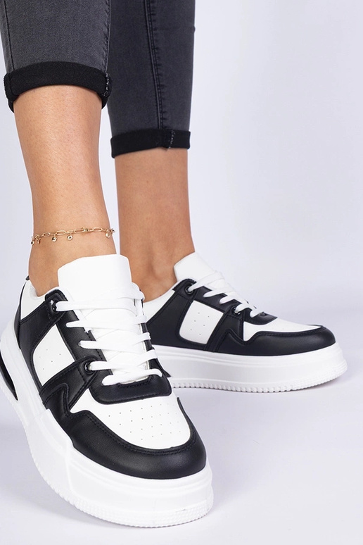 Zapatillas de mujer en blanco y negro...