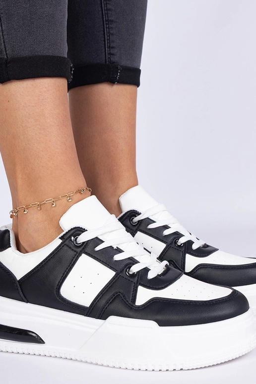 Zapatillas de mujer en blanco y negro...