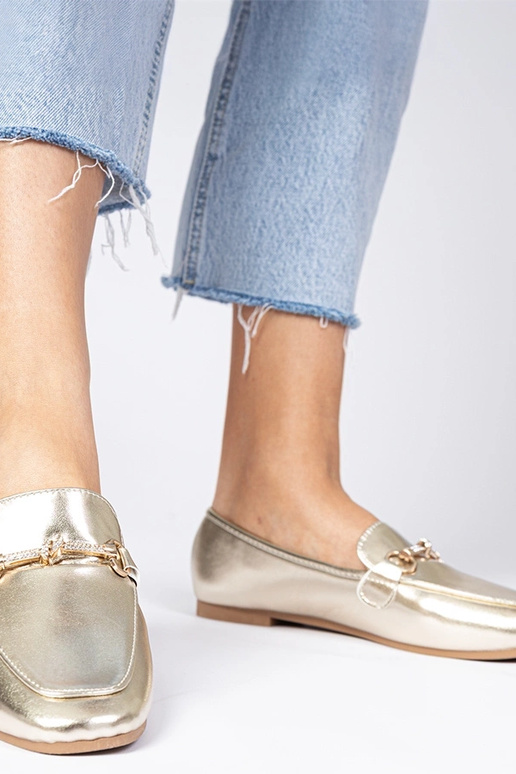 Mocasines dorados con adorno y... Mocasines dorados con adorno y...